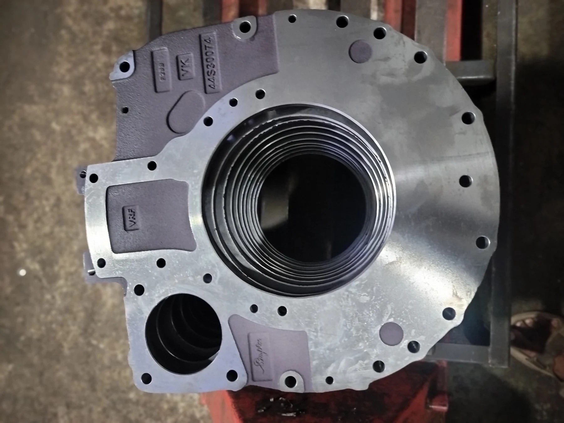Large machined housing with central bore