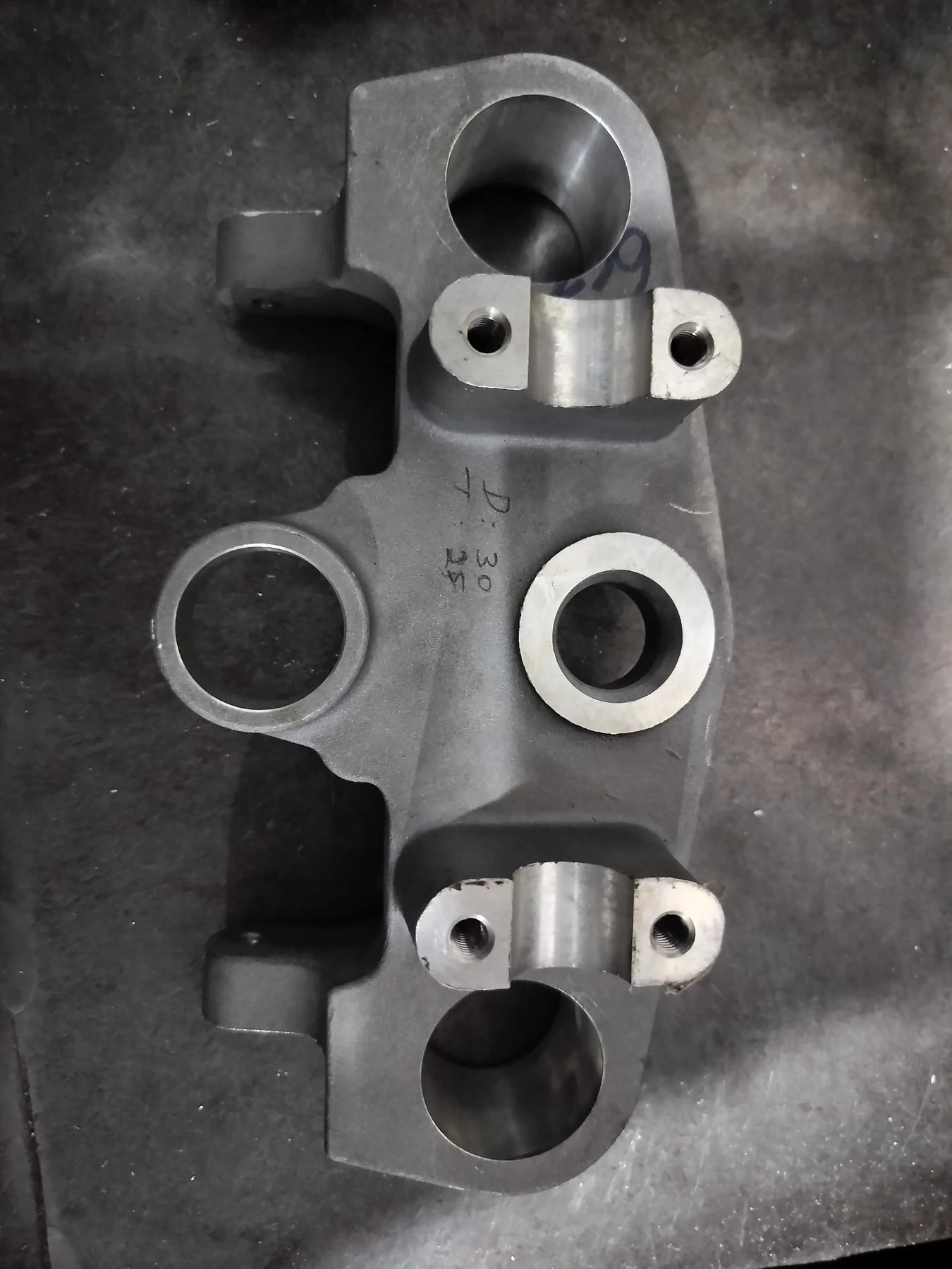 Multi-bore machined bracket